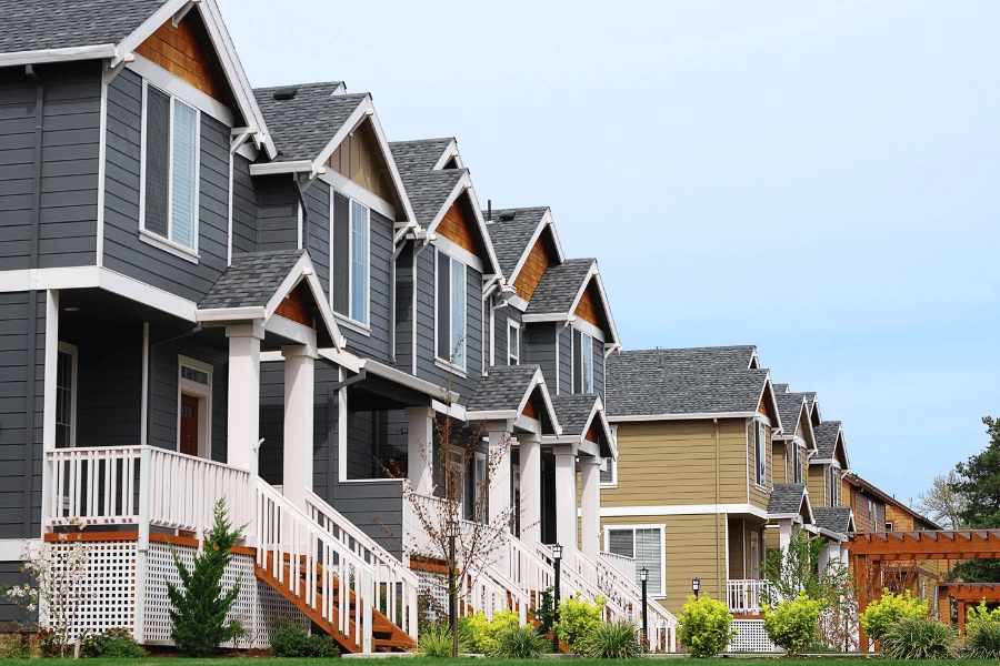 New housing development full of homes that are close together with front porches